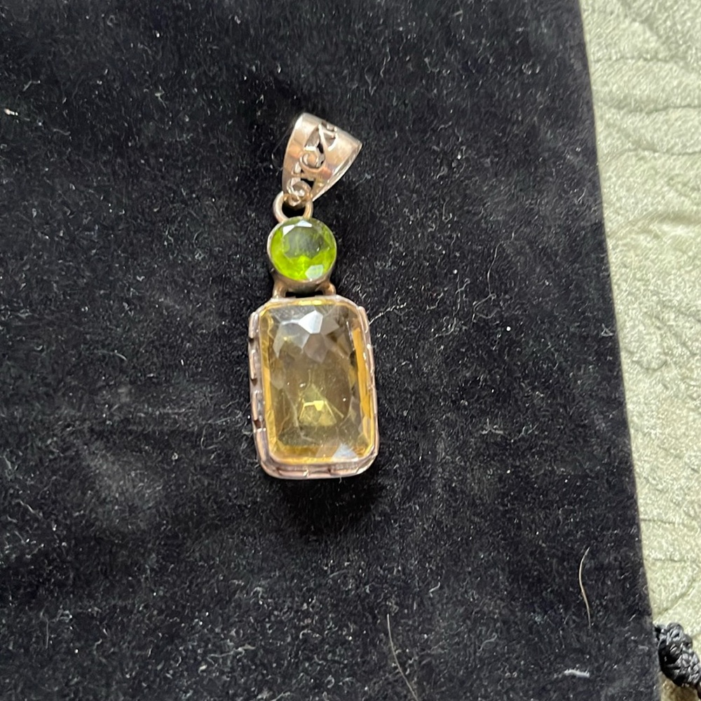 Sterling pendant.  Peridot and Citrine bought at Gem Show